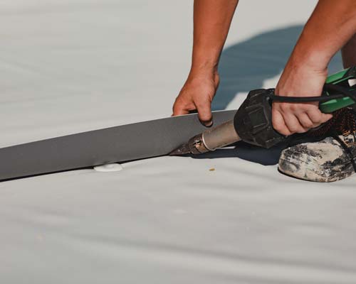 Commercial roof getting repaired