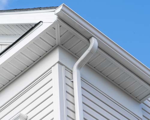 Metal roof with gutter